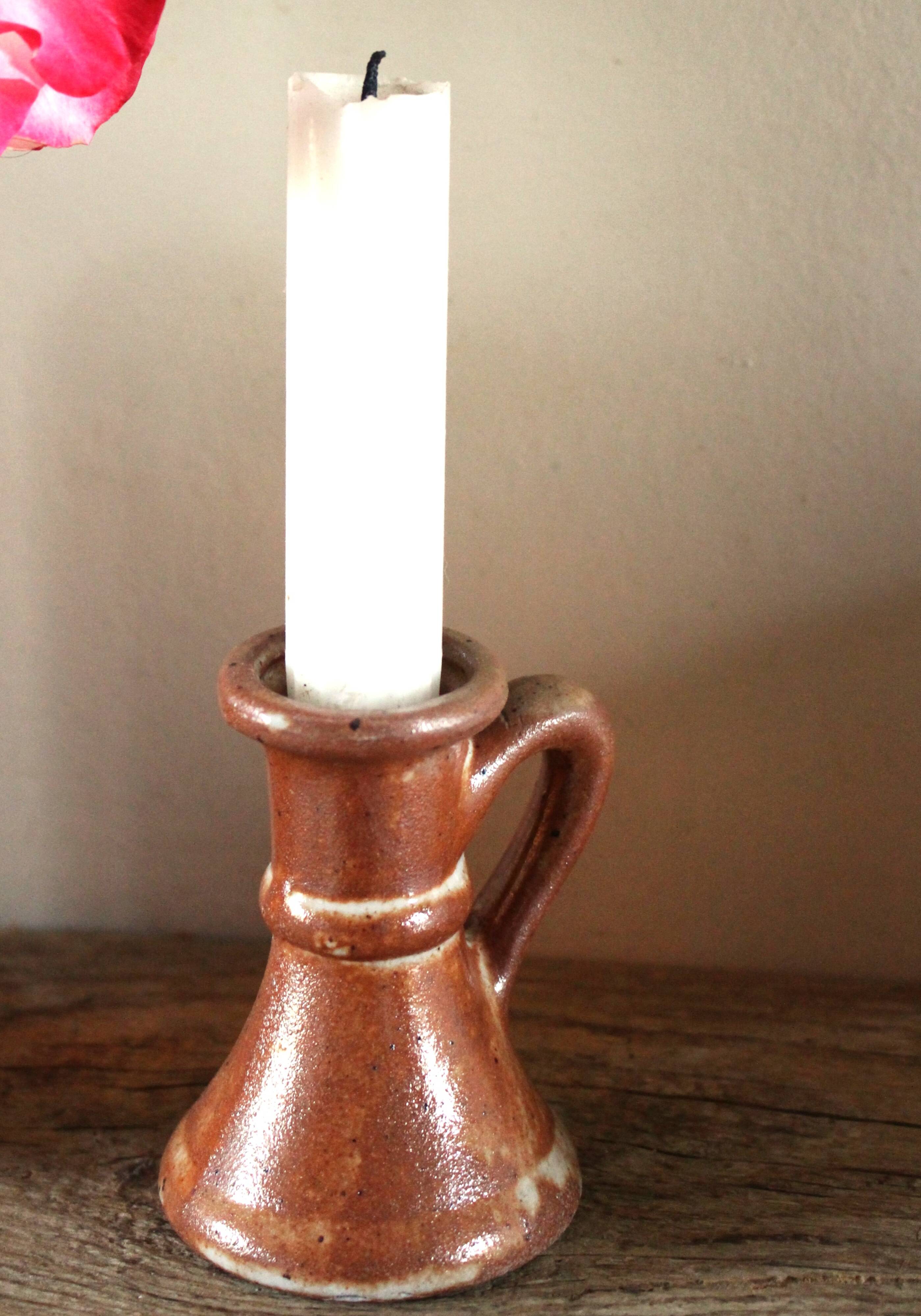 Small vintage marbled stoneware candlestick with handle