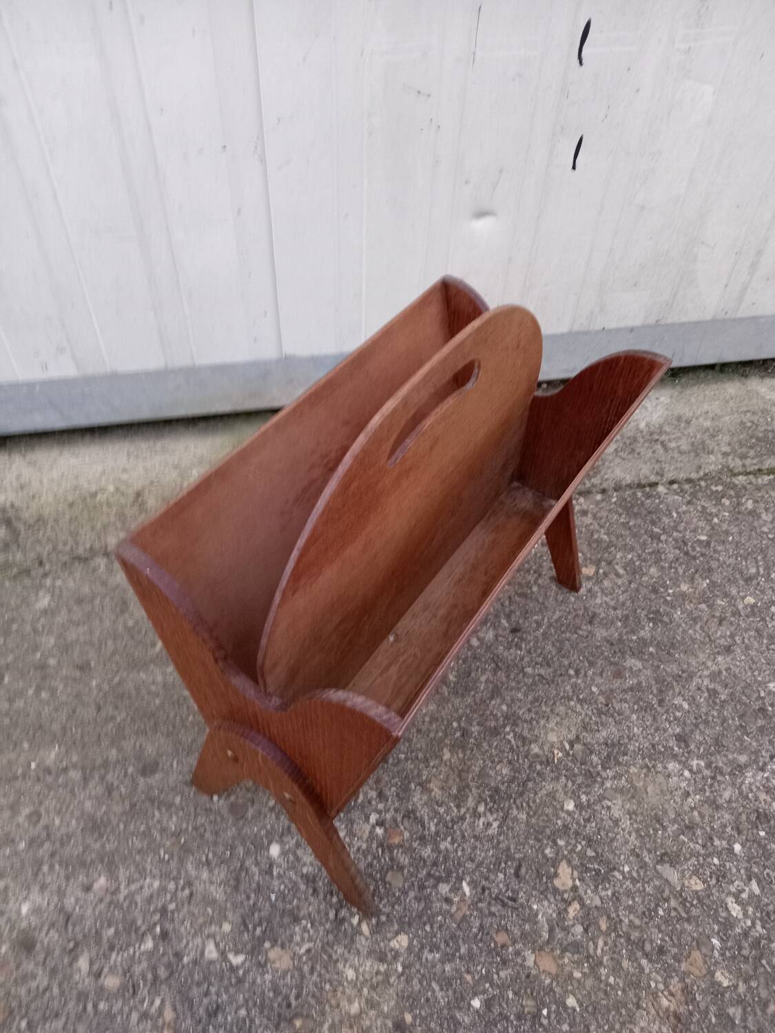 Vintage magazine rack with compass feet