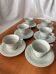 Art Deco cups and saucers by Théodore Haviland in celadon.