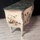 Curved Louis XV style chest of drawers with chinoiserie decoration