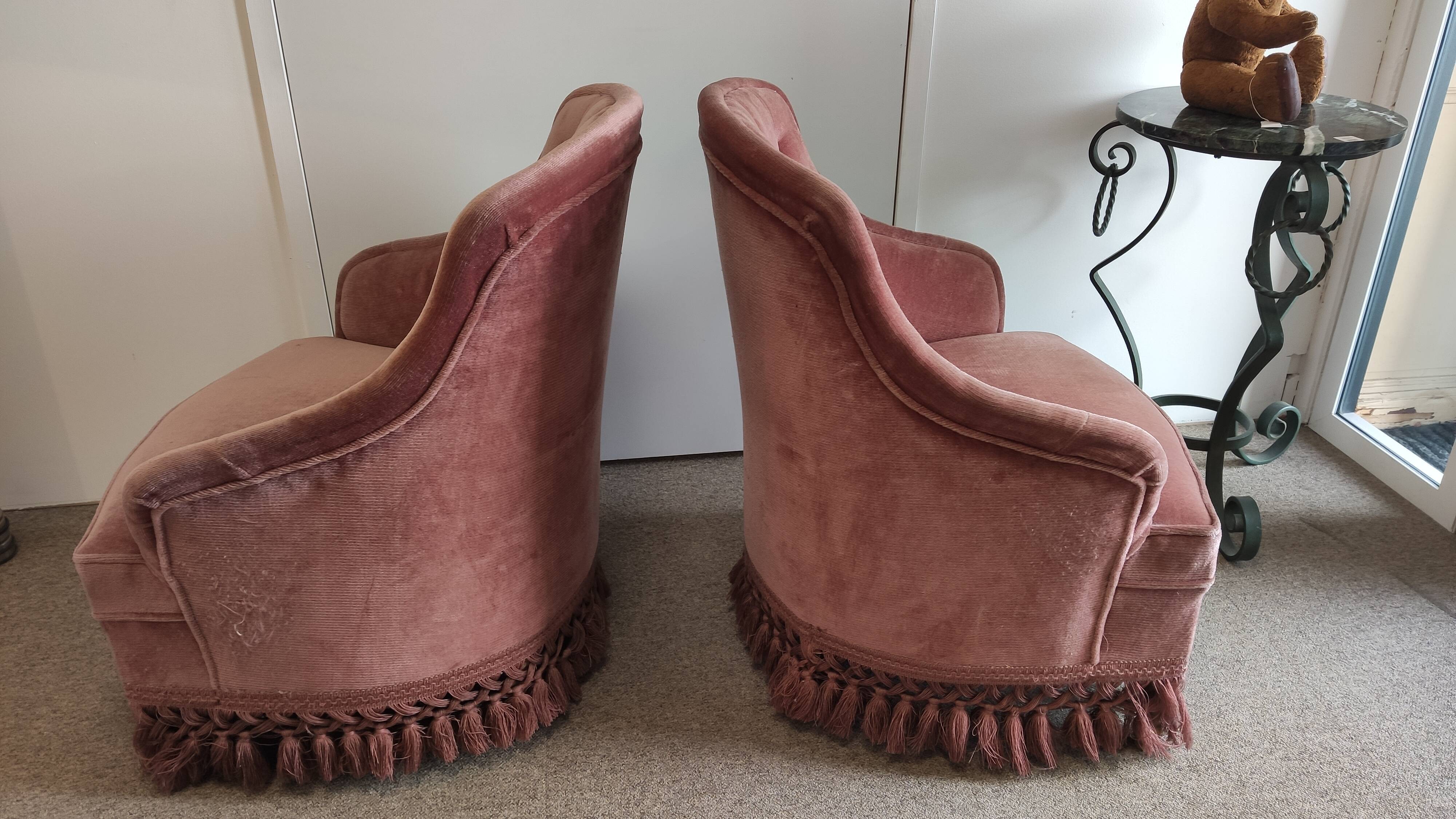 Pair of padded old pink armchairs