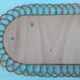 Oval mirror in rattan
