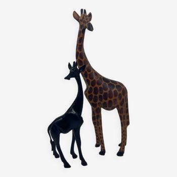 carved wooden giraffes