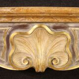 Fireplace in painted and gilded wood