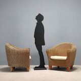 Two wicker armchairs