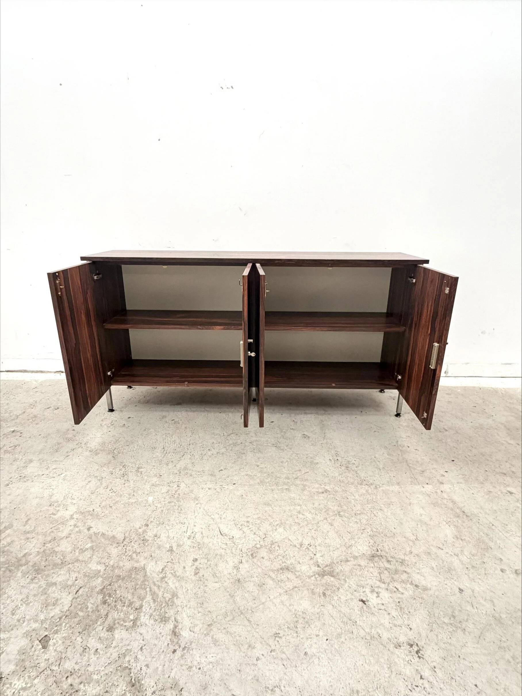 Enfilade in formica imitation rosewood with a chrome base, 1970.