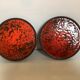 Pair of red speckled ceramic trivets