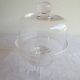 Old glass cake dome on a stand