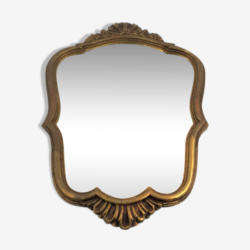 Old mirror in golden resin