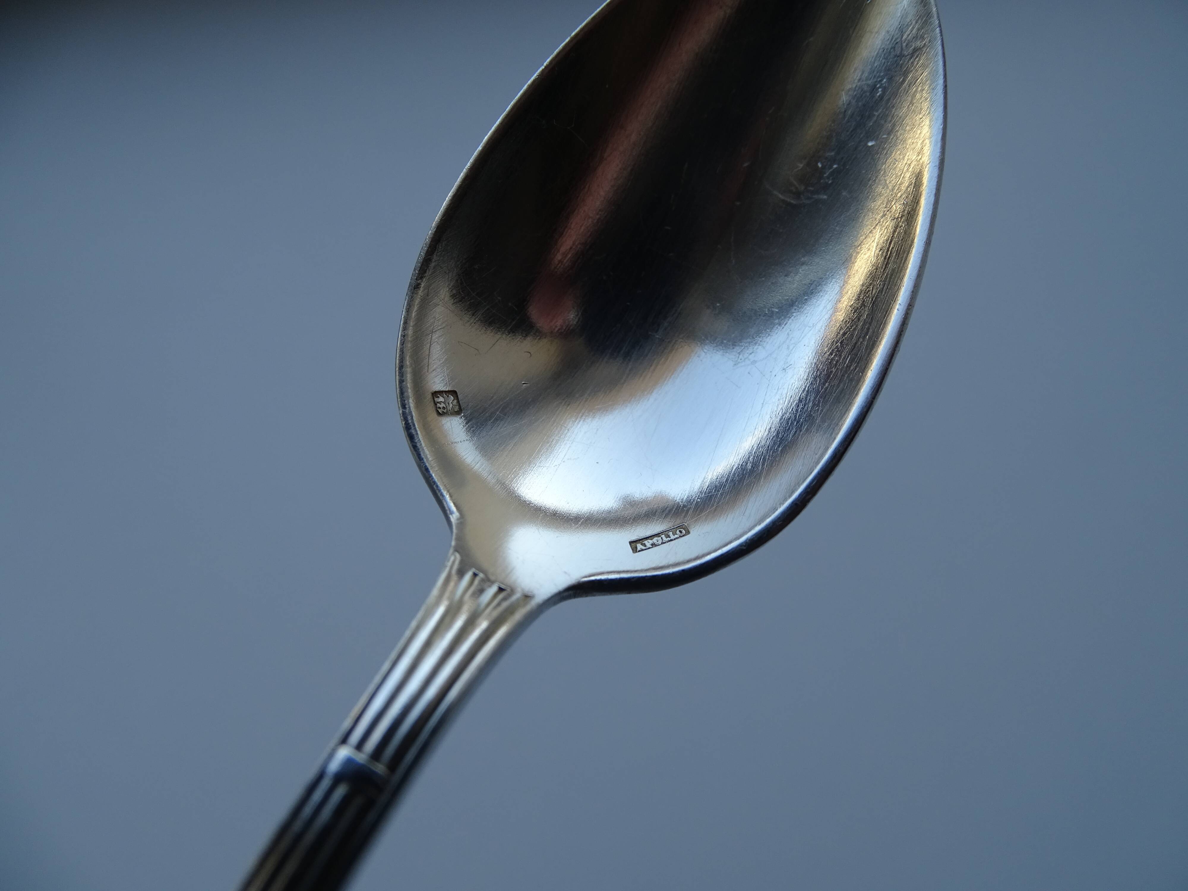 12 dessert spoons Apollo silver metal 1920 in case