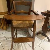Antique straw-covered high chair