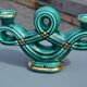 Two green ceramic candlesticks from the 1930s-1940s.