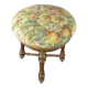 Old upholstered piano stool