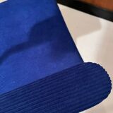 Vintage armchair and its footrest from around 1950.