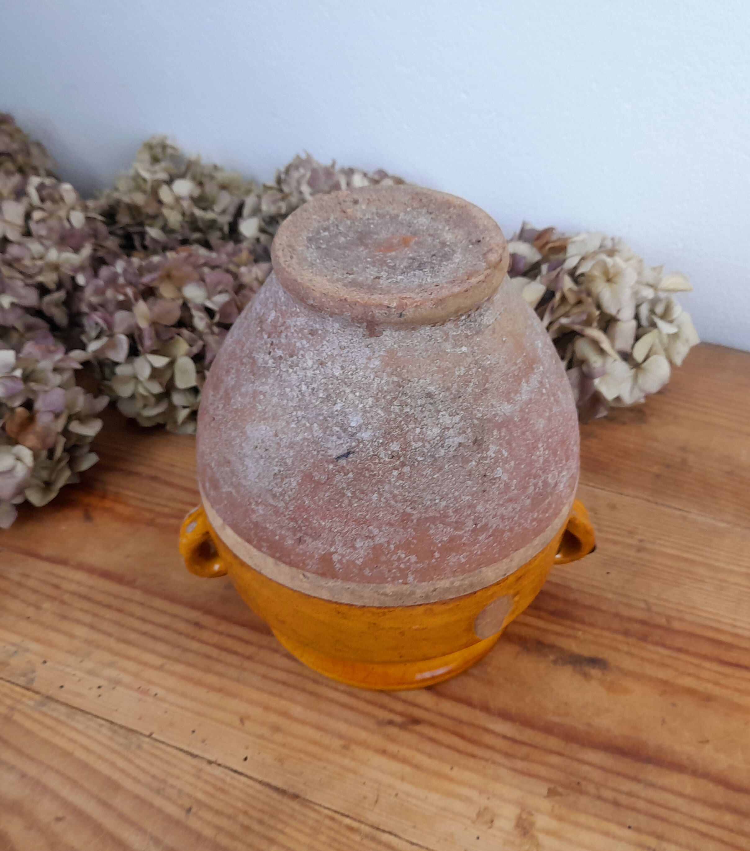 Old glazed terracotta grease pot