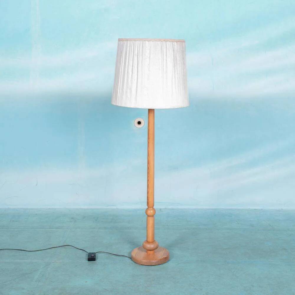 Vintage Swedish wooden floor lamp with pleated shade from the 1960s.
