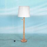 Vintage Swedish wooden floor lamp with pleated shade from the 1960s.