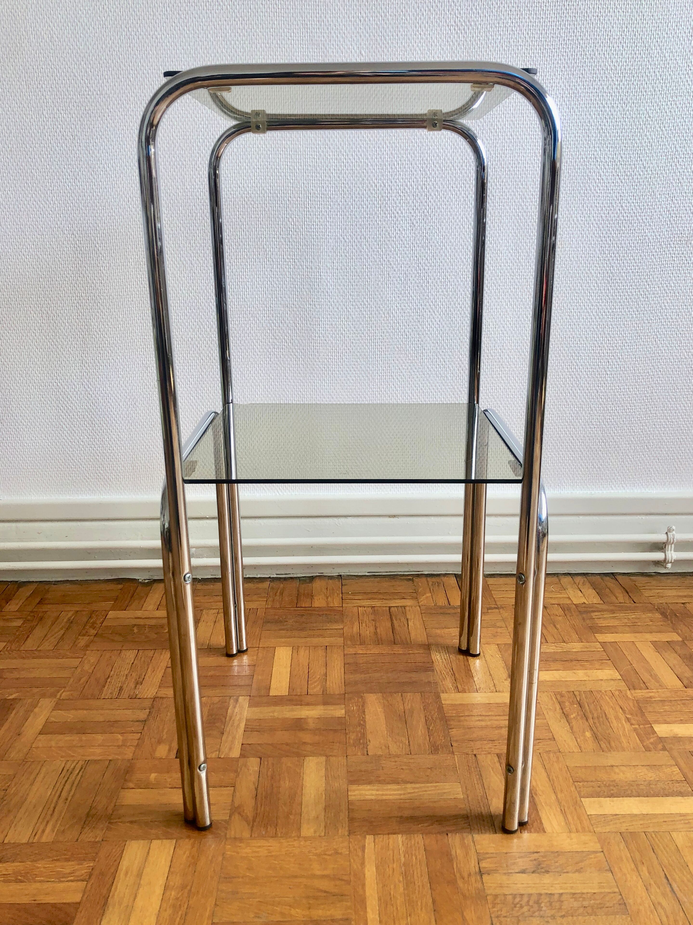 Two-tray console in glass and chrome metal