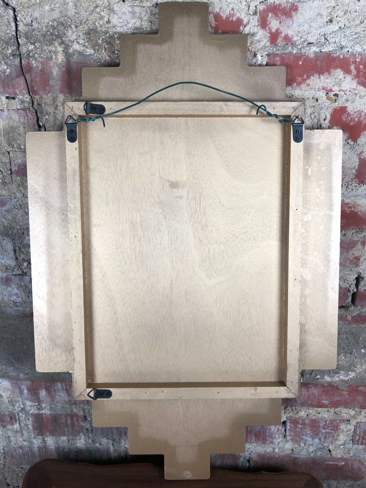Art deco style "miami" mirror in patinated gilded wood 80x52cm