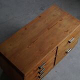 Mid-20th century Art Deco chest of drawers in pine with metal handles, 1940s.