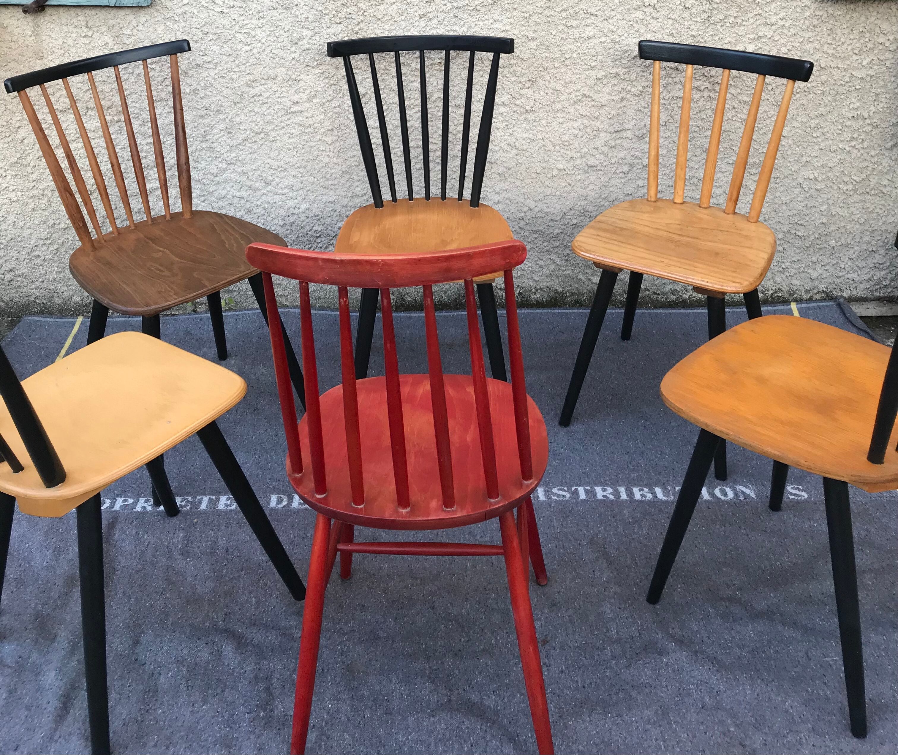 Set of 6 mismatched vintage chairs with bars and compass legs