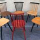 Set of 6 mismatched vintage chairs with bars and compass legs