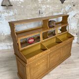 Wooden hardware cabinet painted with wood effect, circa 1940.