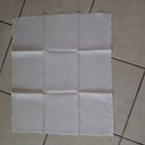 Set of 6 white damask hemmed napkins with handmade stitching and monogram.