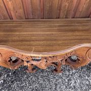 Pair of carved wall consoles in Louis XV style
