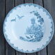Duo of old plates in Iron Earth decorated with birds and butterflies
