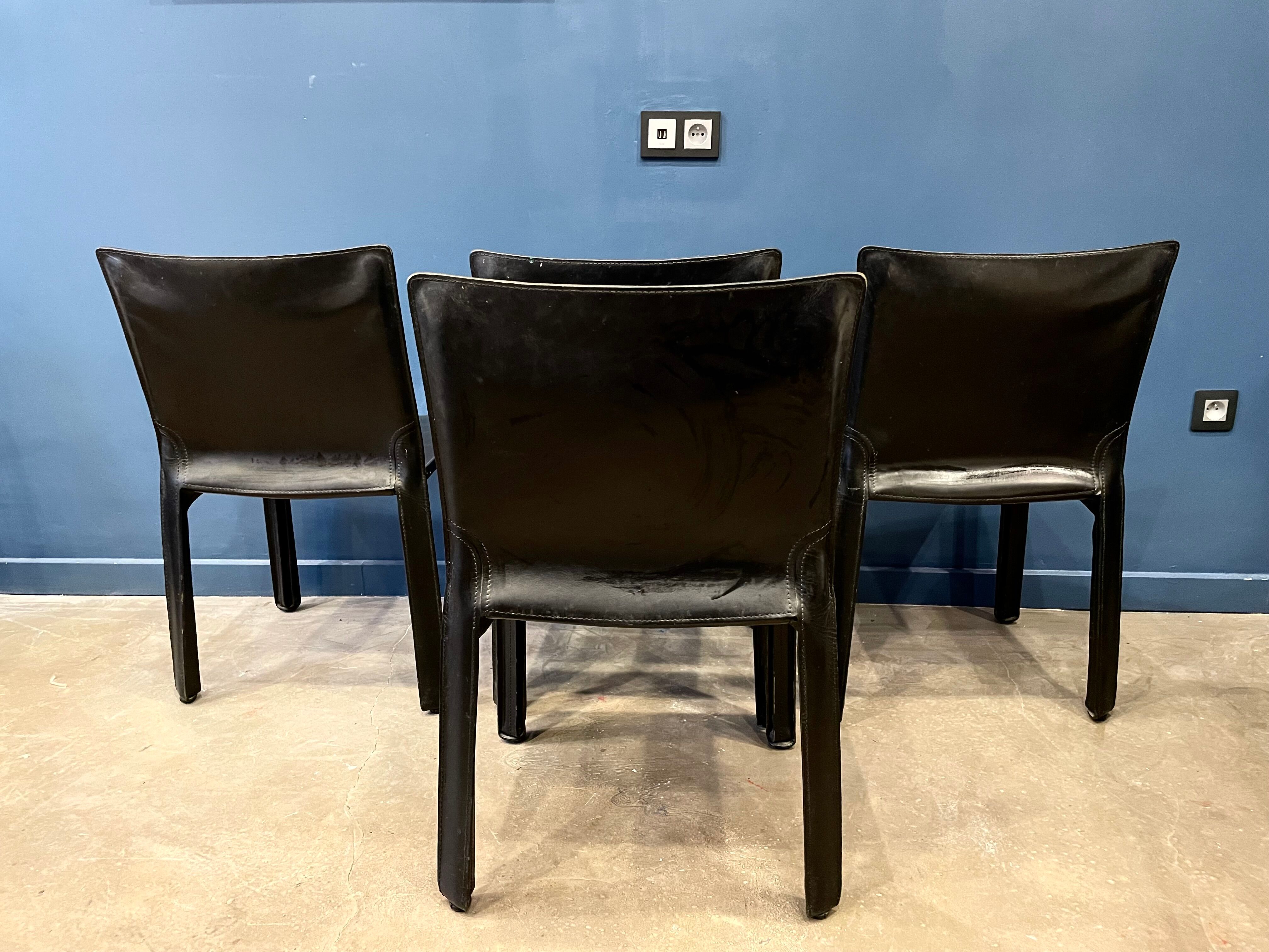 4 black leather chairs 412 cab by Mario Bellini signed Cassina