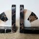 Art Deco pair of bookends in Portor marble and onyx, 1930s-1950s.
