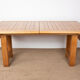 Large extendable dining table in solid oak by Guillerme and Chambron.