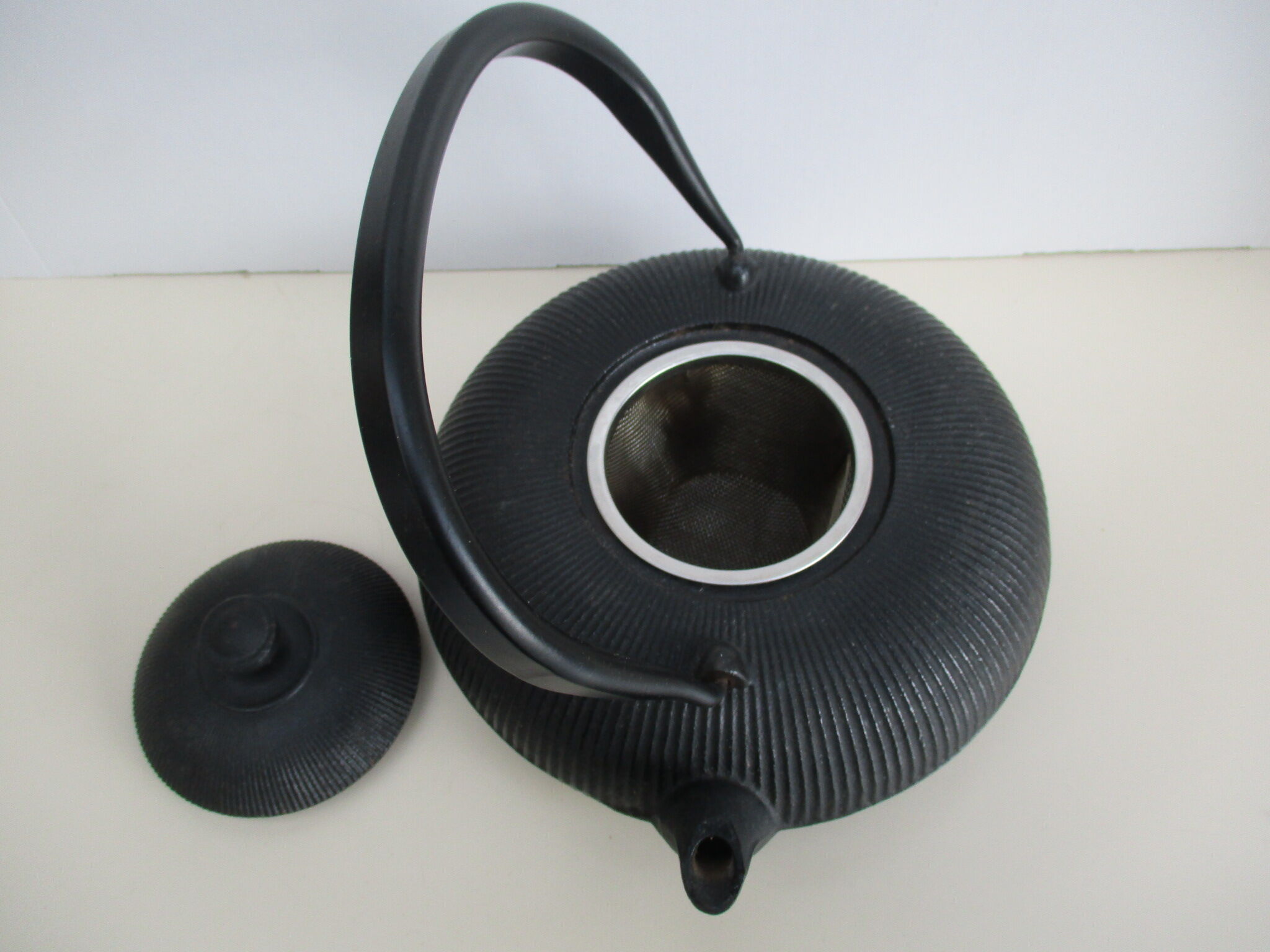 Asian teapot in black cast iron