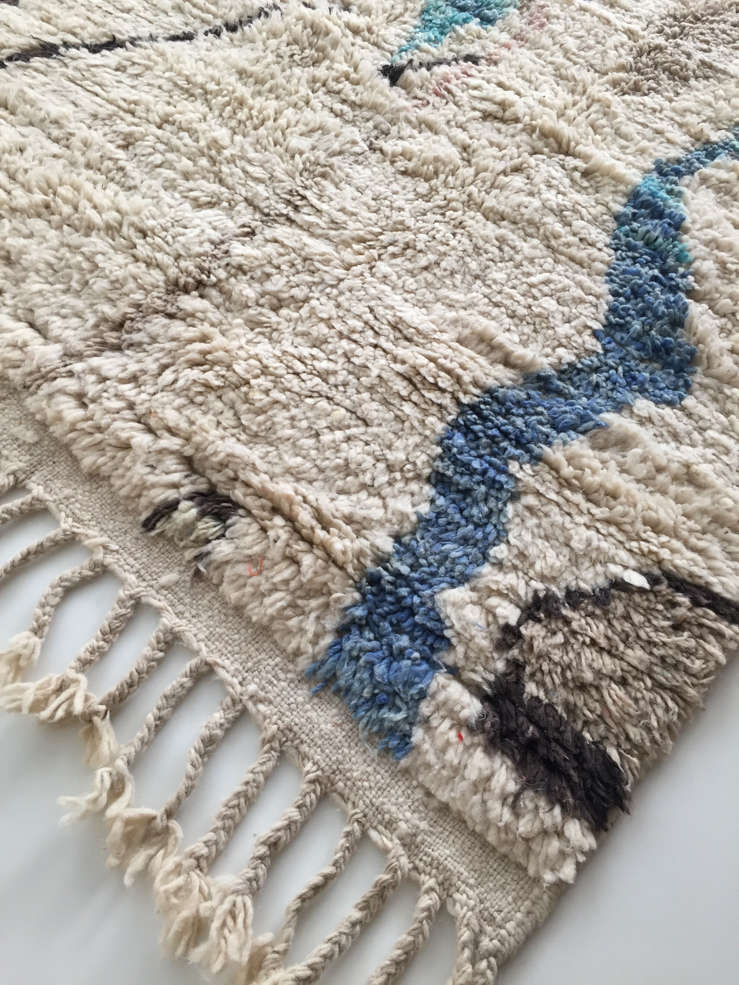 Moroccan Berber carpet Boujaad ecru with colorful patterns 228x157cm