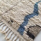 Moroccan Berber carpet Boujaad ecru with colorful patterns 228x157cm