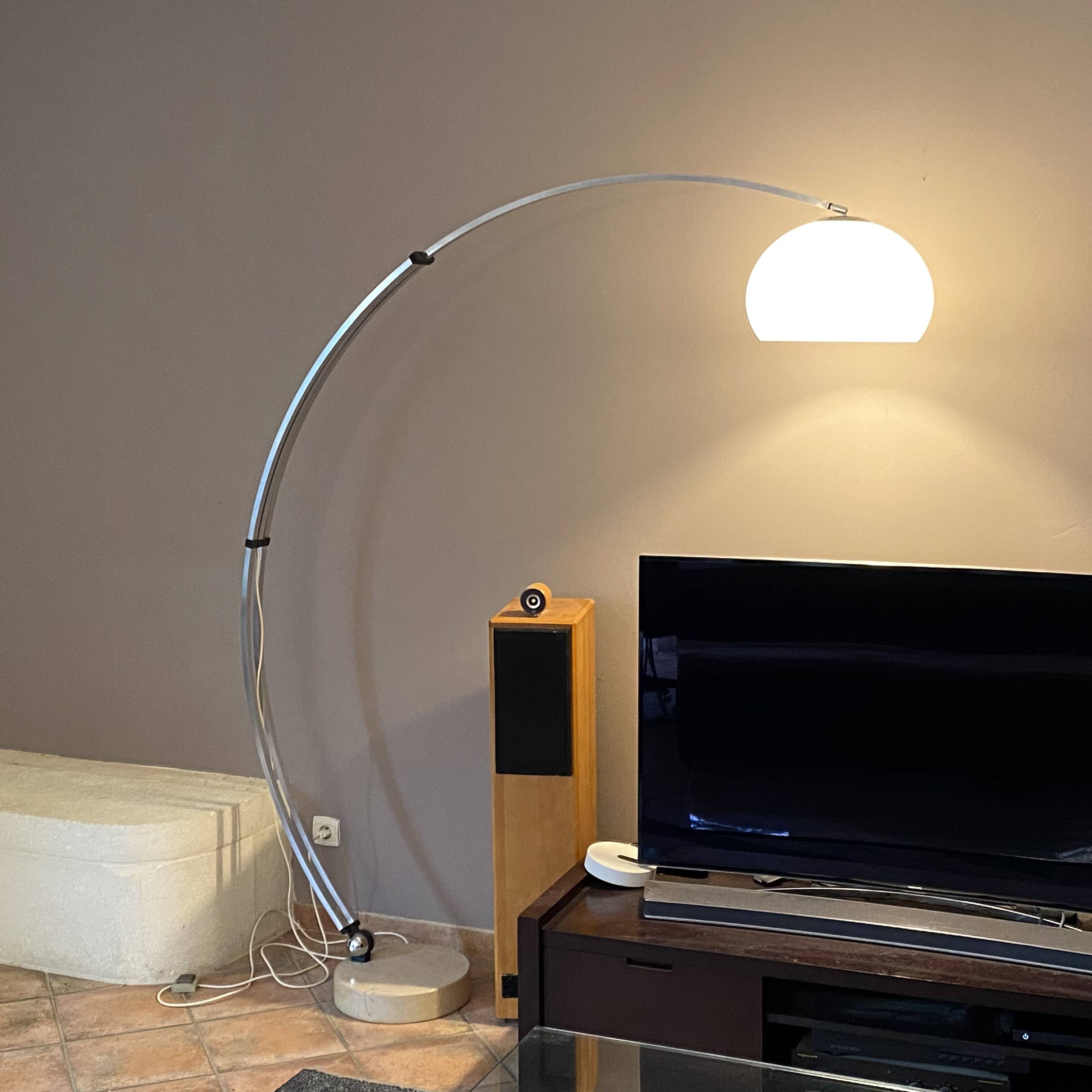 Guzzini arc floor lamp. 1970. Italy. Marble base.