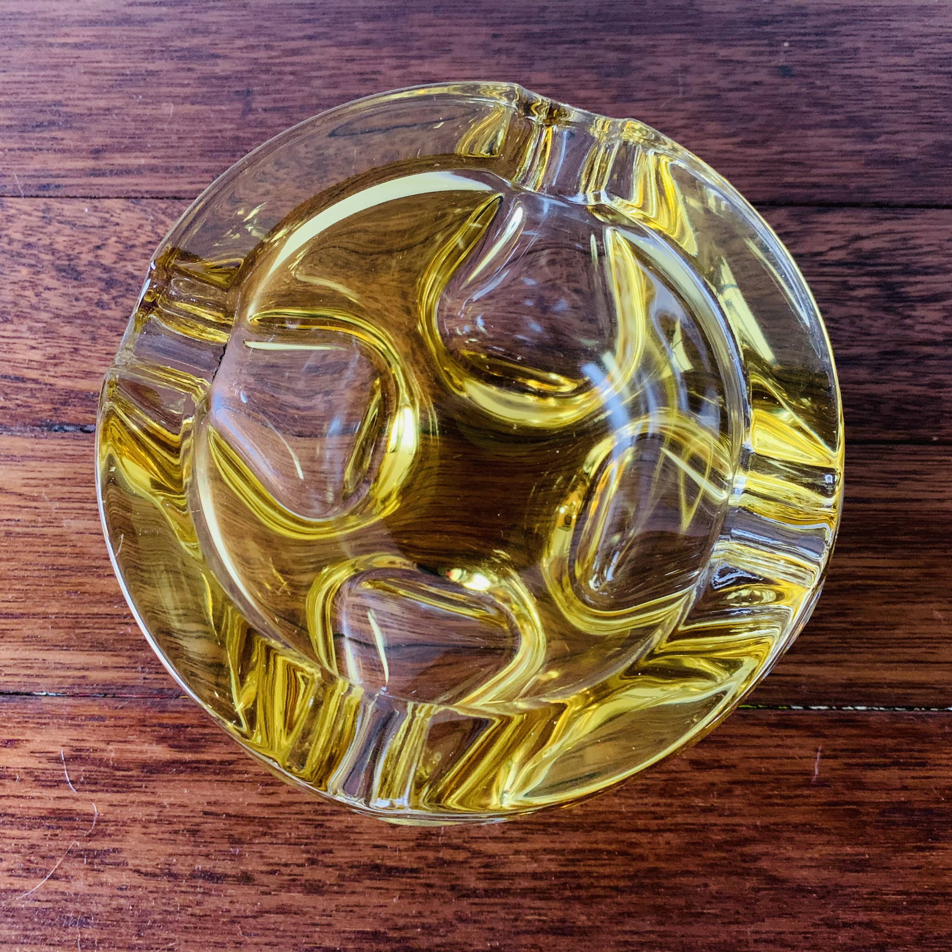 Vintage ashtray in yellow and transparent molded glass