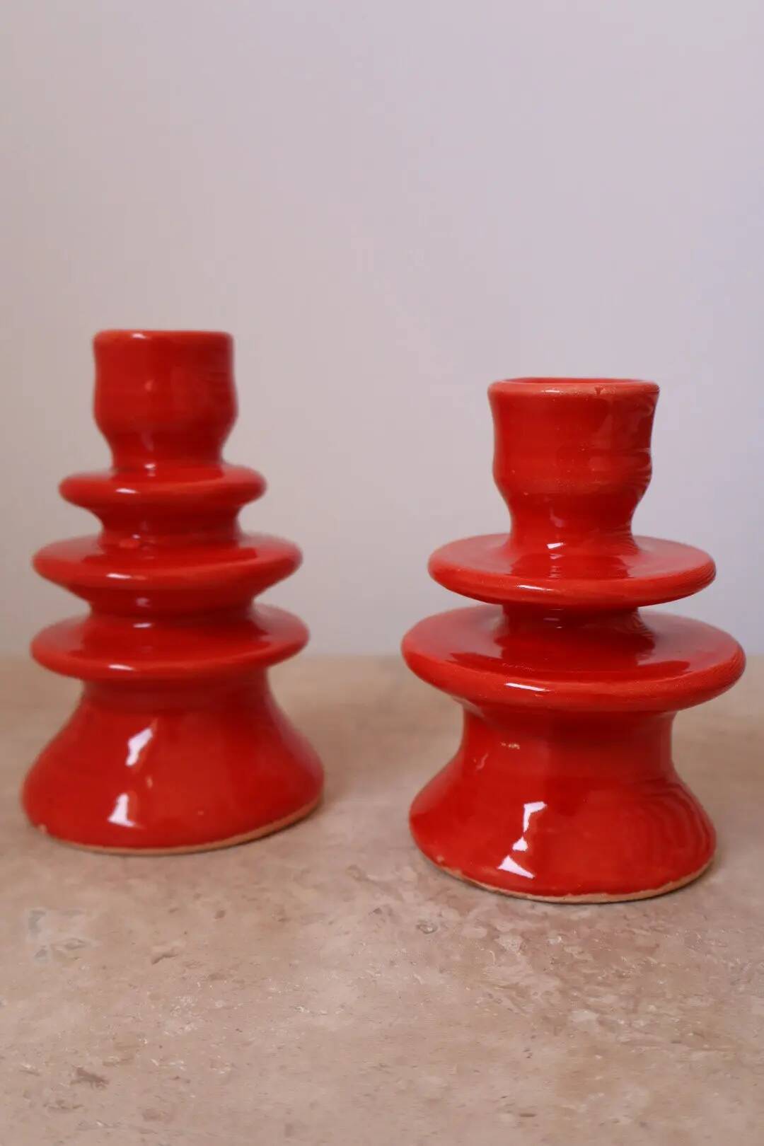 Pair of colorful poppy red ceramic candle holders
