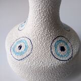 White and blue ceramic vase with italian relief