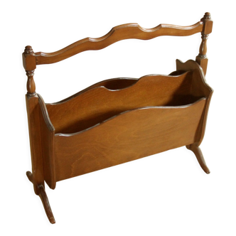 Old magazine rack made of walnuttree wood, vintage from the 1960s