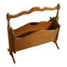 Old magazine rack made of walnuttree wood, vintage from the 1960s