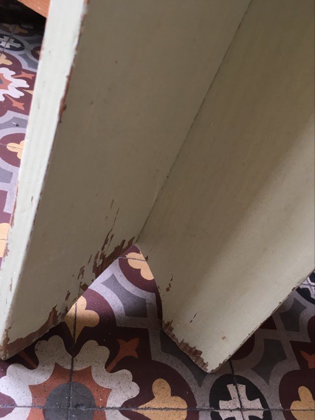 A rough wooden stool patinated by time