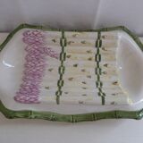 Plate of asparagus with a sauce.