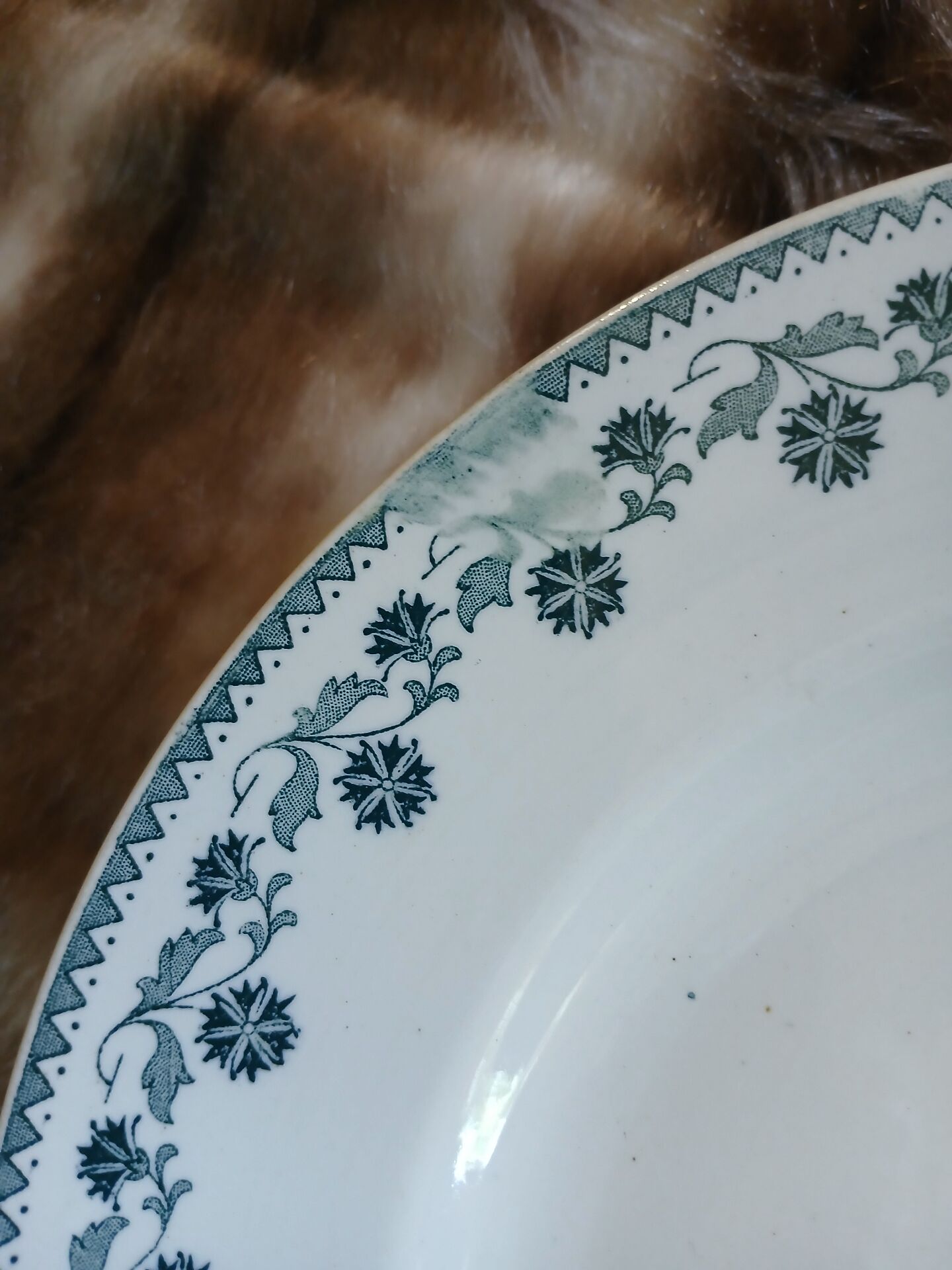 13 mismatched flat plates in ironstone