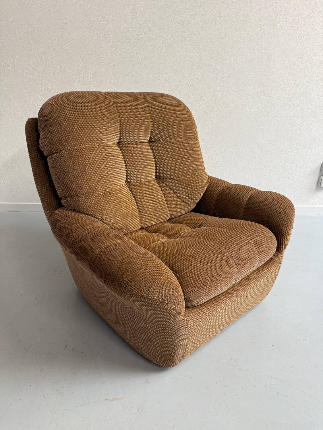 Old vintage 60s fabric lounge chair