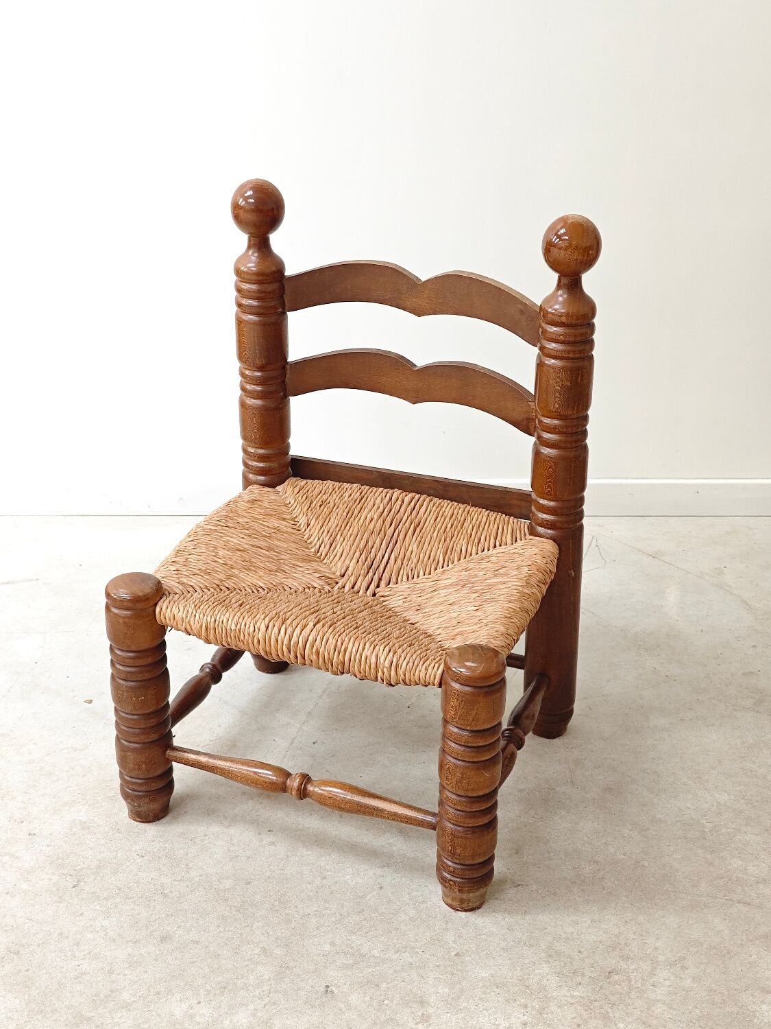 Small Charles Dudouyt chair in wood and straw