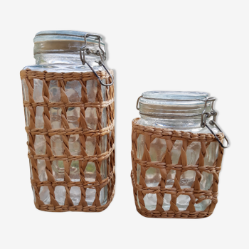 Pair of glass jars and rush