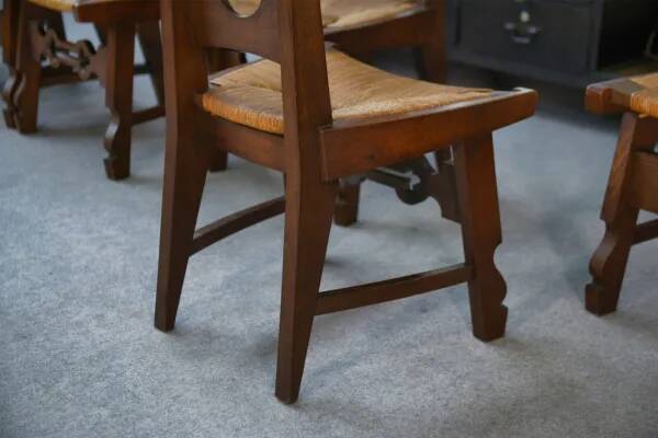 8 rustic oak chairs combining modern lines and Breton craftsmanship by a student of Joseph Savina 1950s