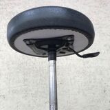 Stool on metal stand in star on wheels sitting round padded skaï bluish